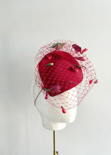 Red Persephone with handmade Carnation petals and soft veil
