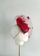 Red Persephone with handmade Carnation petals and soft veil