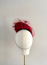 Red Persephone with handmade Carnation petals and soft veil