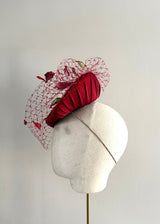 Red Persephone with handmade Carnation petals and soft veil