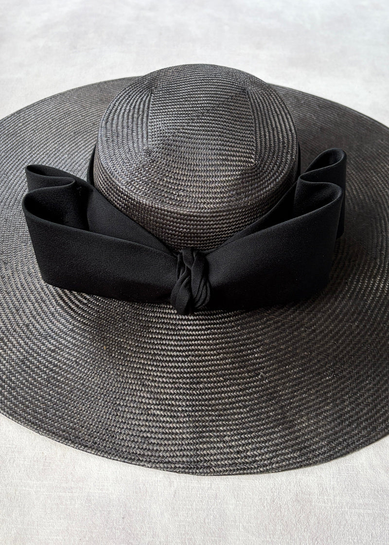 Enid Boater Hat in Straw with Satin Bow in Dark Brown