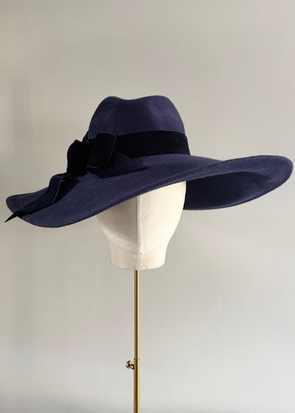 Sweeping Brim Hat in Felt with Velvet Bow in Navy