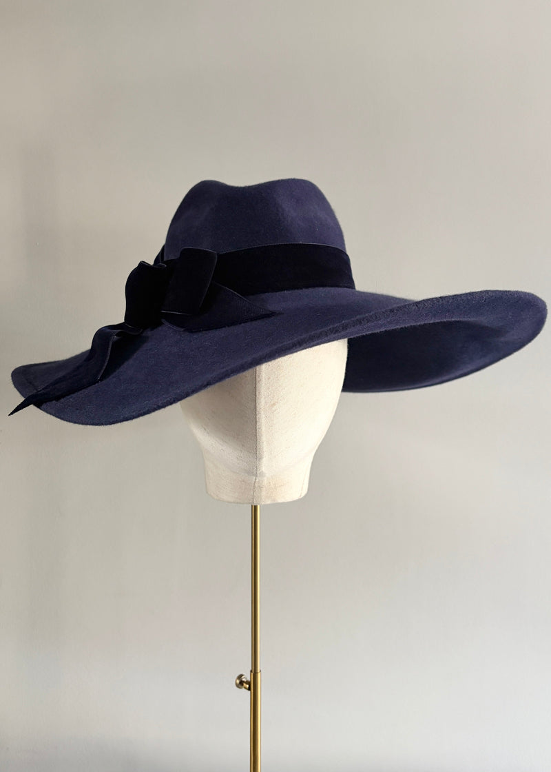 Sweeping Brim Hat in Felt with Velvet Bow in Navy