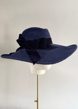 Sweeping Brim Hat in Felt with Velvet Bow in Navy