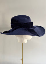 Sweeping Brim Hat in Felt with Velvet Bow in Navy