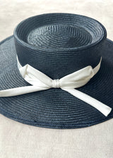 Nixi Boater in Straw with Satin Bow in Navy