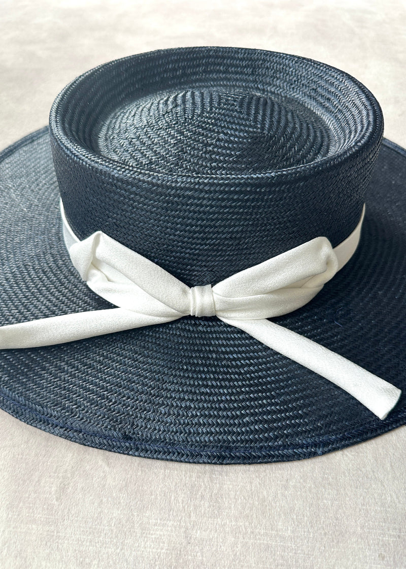 Nixi Boater in Straw with Satin Bow in Navy