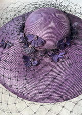 Downturned Brim Hat in Straw with Veiling and Vintage Flowers in Purple