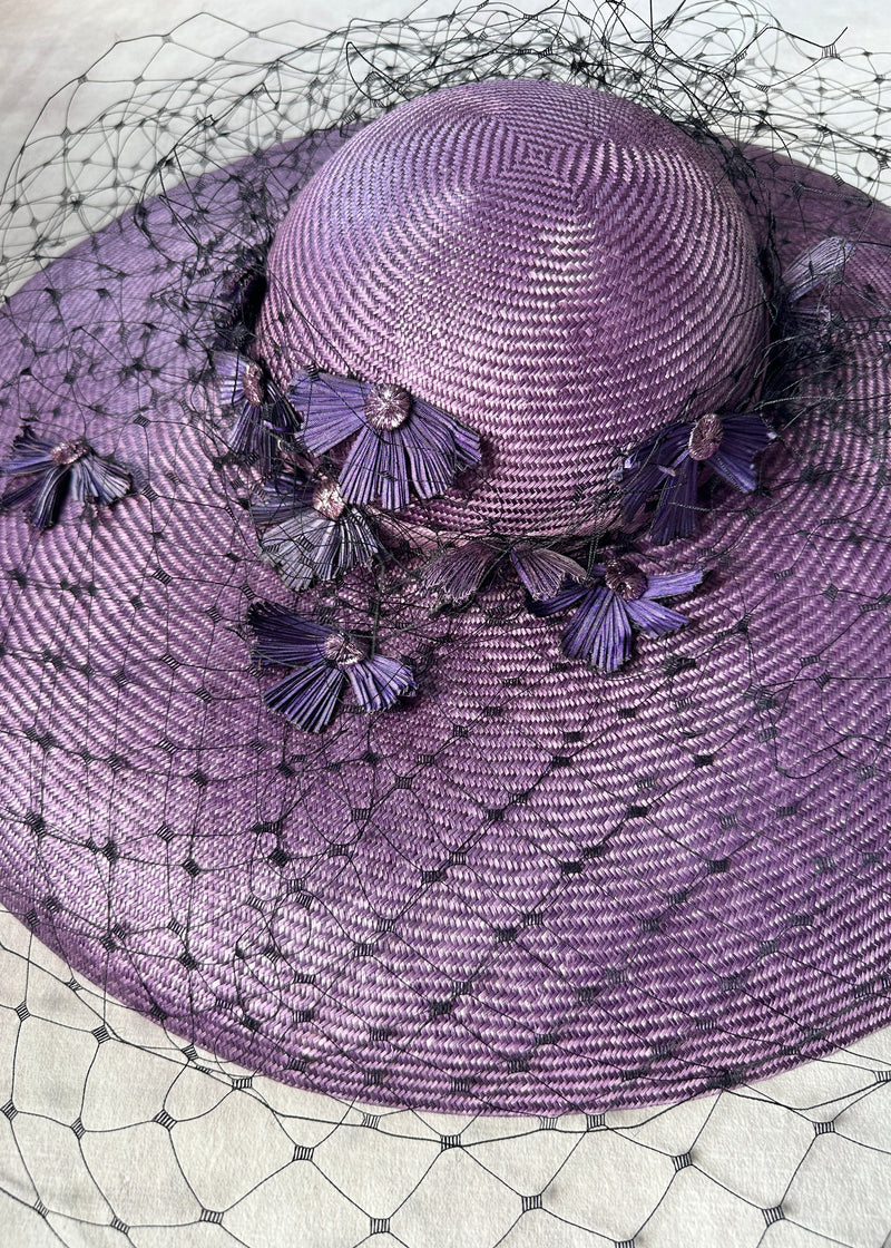 Downturned Brim Hat in Straw with Veiling and Vintage Flowers in Purple