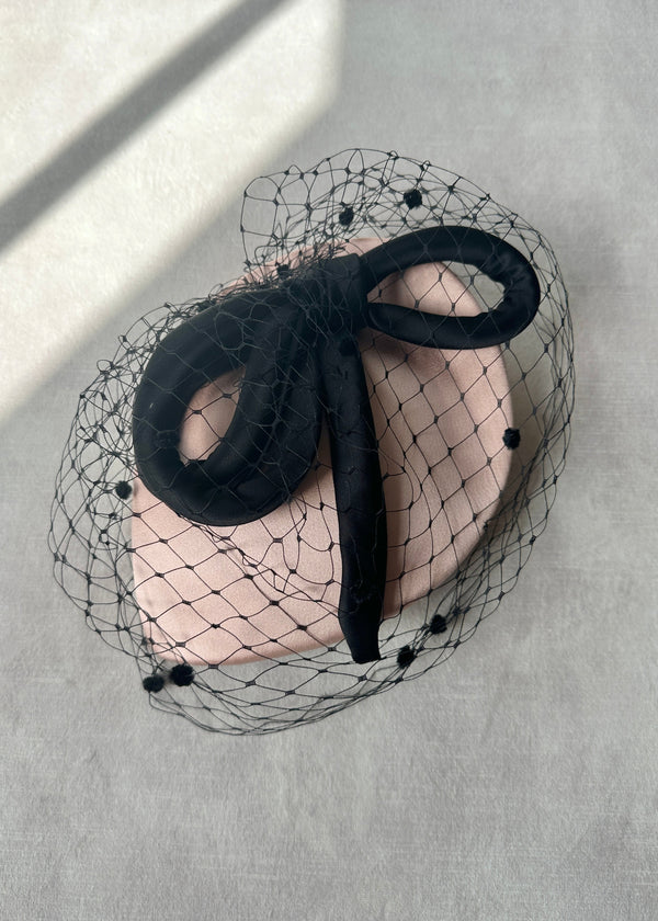 Persephone Hat in Satin with Spotted Veiling and Bow in Dusky Blush