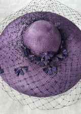 Downturned Brim Hat in Straw with Veiling and Vintage Flowers in Purple