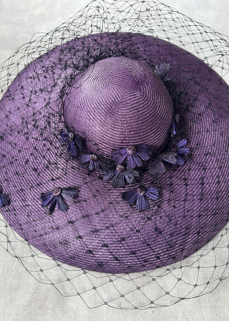 Downturned Brim Hat in Straw with Veiling and Vintage Flowers in Purple