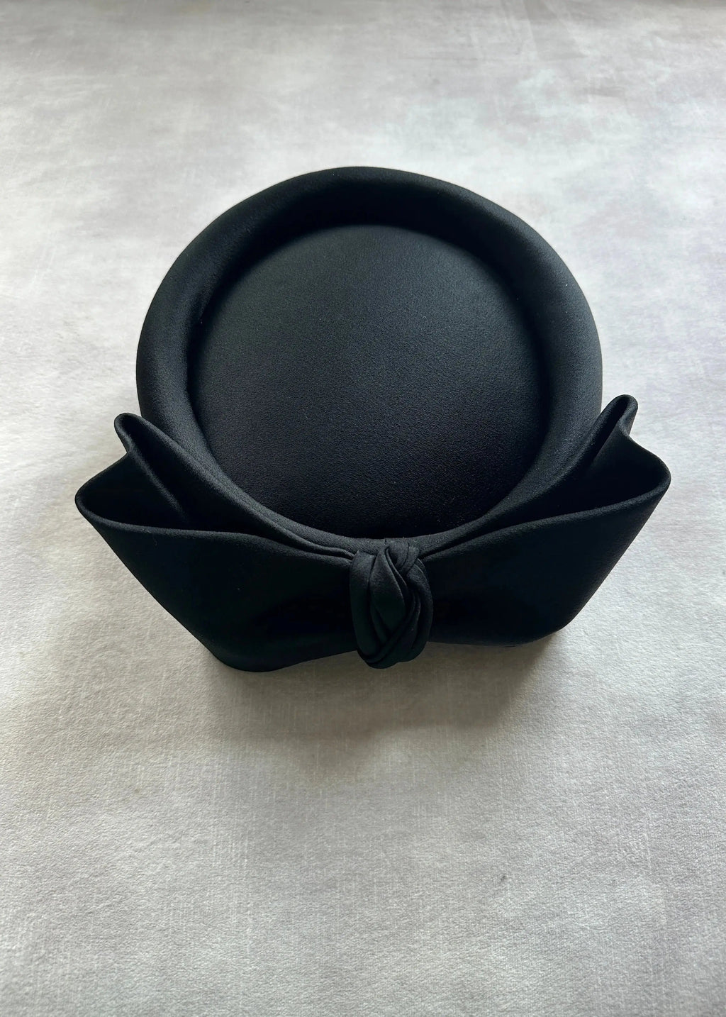 The Halo Pillbox in Satin with Crushed Bow in Black Jane Taylor
